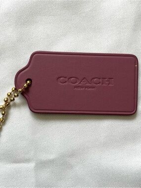COACH Mauve Leather Purse Tag